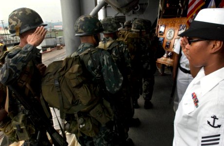US Navy 060817-N-9851B-002 Seaman Doris Campbell stands watch on the quarter deck of the amphibious dock landing ship USS Tortuga (LSD 46)