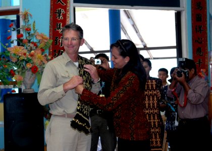 US Navy 060820-N-3714J-049 Commander Amphibious Squadron 7, Capt. Bradley D. Martin, receives a gift from the people of Kupang as a token of friendship and thanks for the Military Sealift Command (MSC) hospital ship USNS Mercy