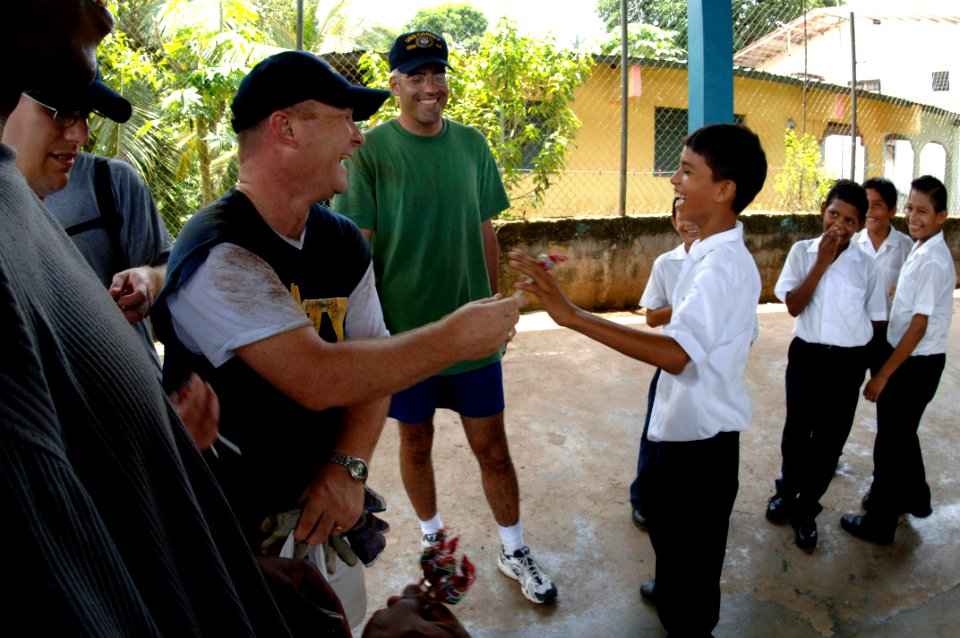 US Navy 060822-N-8298P-007 Chief petty officer selectees assigned to the guided-missile destroyer USS Carney (DDG 64) participate in a community relations (COMREL) project for the Escuela la Provareda Elementary School located