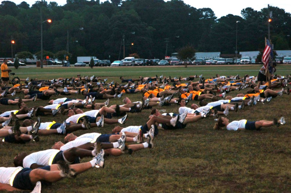 US Navy 060817-N-0924R-034 Chief selectees warm up before the three-mile Chief Petty Officers (CPO) Heritage Run at Naval Amphibious Base Little Creek