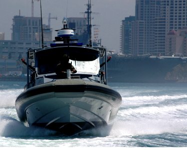 US Navy 060823-N-5148B-006 Sailors assigned Inshore Boat Unit Five Two (IBU-52) train in boat maneuvers while participating in Exercise Seahawk 2006 photo