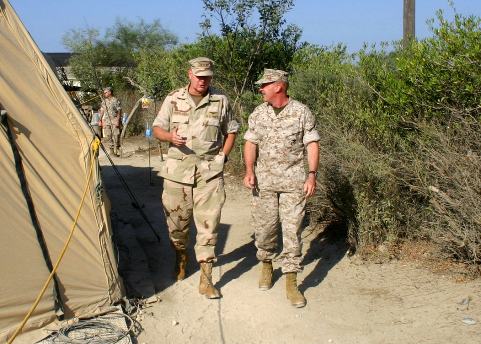 US Navy 060822-N-2893B-001 Commander, Joint Task Force (JTF) Lebanon, Vice Adm. J. Boomer Stufflebeem, discusses transfer of authority issues with Commander, Task Force 59 Marine Corps Brig. Gen. Carl Jensen in Cyprus