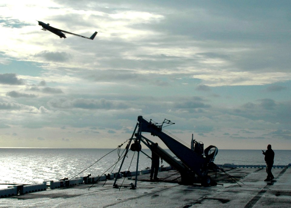 US Navy 060818-N-8547M-002 An Unmanned Aerial Vehicle (UAV) Scan Eagle launches from the flight deck aboard the amphibious assault ship USS Saipan (LHA 2)