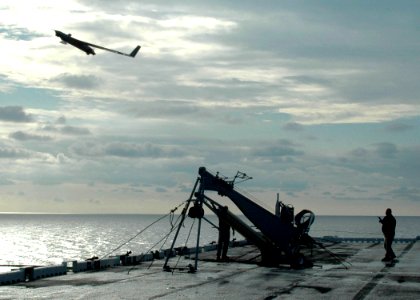 US Navy 060818-N-8547M-002 An Unmanned Aerial Vehicle (UAV) Scan Eagle launches from the flight deck aboard the amphibious assault ship USS Saipan (LHA 2)