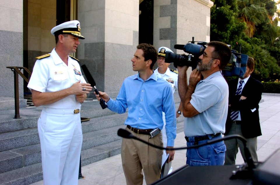 US Navy 060823-N-6843I-124 Commander, Navy Region Southwest Rear Adm. Len R. Hering Sr. speaks to reporters during a press conference for assembly bill (AB) 1965 at the California State Capitol building