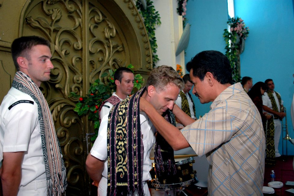 US Navy 060820-N-3714J-073 Members of the U.S. Navy Show band, embarked with the Medical Treatment Facility aboard the Military Sealift Command (MSC) hospital ship USNS Mercy (T-AH 19), receive gifts from the people of Kupang