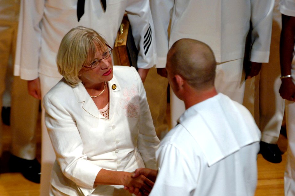 US Navy 060824-N-5758H-031 Virginia Congresswoman Thelma Drake-(R) congratulates a Sailor for his outstanding performance, during the Military Recognition Reception at Crispus Attucks Cultural Center in Norfolk, Va