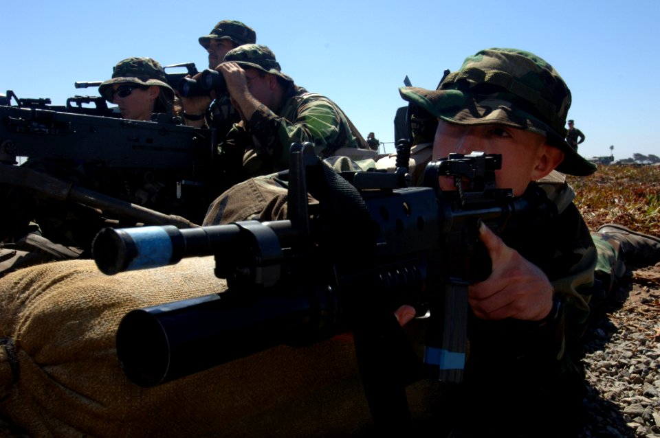 US Navy 060828-N-9818V-061 Master-at-Arms 3rd Class Eric McGowan, assigned to Mobile Security Squadron Three, takes position during a simulated riot drill at Camp Fish in support of Exercise Seahawk 2006