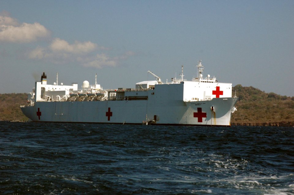 US Navy 060820-N-9076B-013 The Military Sealift Command (MSC) hospital ship USNS Mercy (T-AH 19) is anchored off the coast of Kupang for one week while the crew provides humanitarian and civic assistance to the people of this c