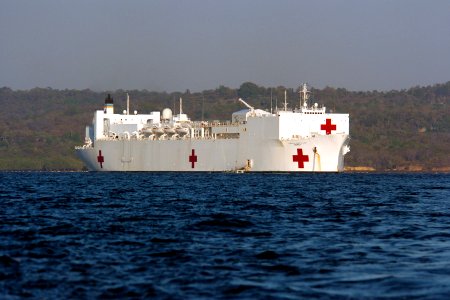 US Navy 060823-N-6501M-002 Military Sealift Command (MSC) hospital ship, USNS Mercy (T-AH 19) sits off the coast of Kupang, while its crew and medical staff provide care to the people living on this Indonesian island