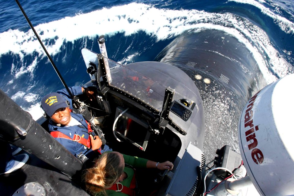 US Navy 060825-N-7441H-015 The Virginia-class submarine USS Texas (SSN 775) heads out to sea with group of local and national media