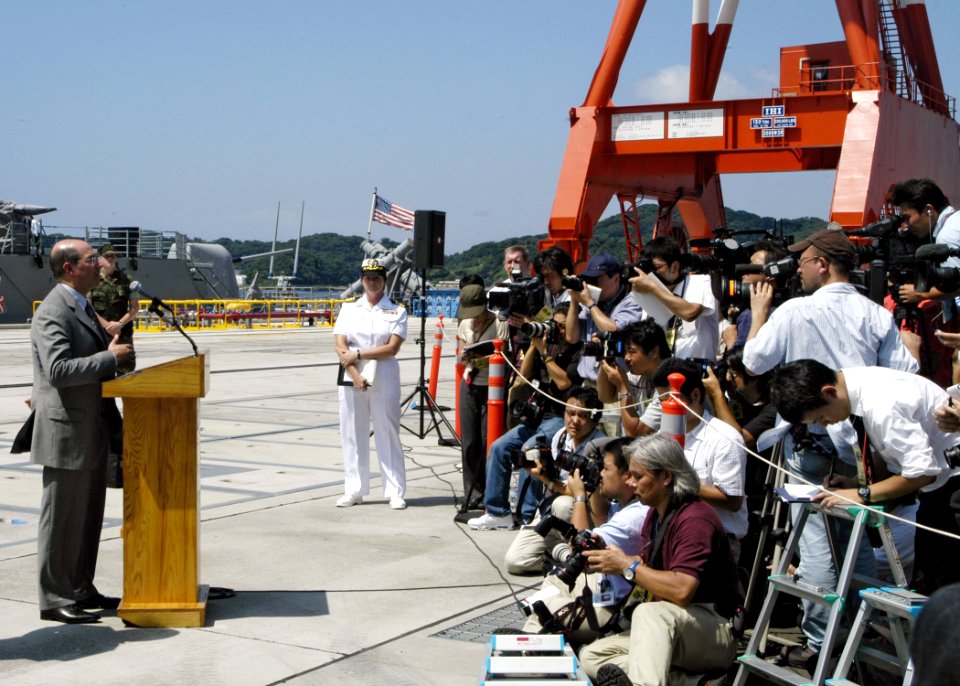 US Navy 060829-N-4649C-217 Secretary of the Navy, the Honorable Dr. Donald C. Winter, answers questions for the local Japanese media during his visit to Commander, Fleet Activities Yokosuka, Japan