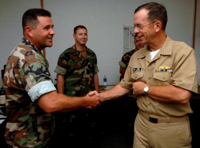 US Navy 060829-N-5758H-022 Chief of Naval Operations (CNO) Adm. Mike Mullen greets Senior Chief Boatswain's Mate Kevin P. Sherwood during a visit to Riverine Group One (RIVRON-1) and Riverine Squadron One at Naval Amphibious Ba