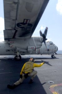 US Navy 060824-N-8604L-254 Lt. Cmdr. Keith Demetriades launches a C-2A Greyhound assigned to Fleet Logistics Support Squadron three Zero (VRC-30) off the flight deck of the conventional powered aircraft carrier USS Kitty Hawk (