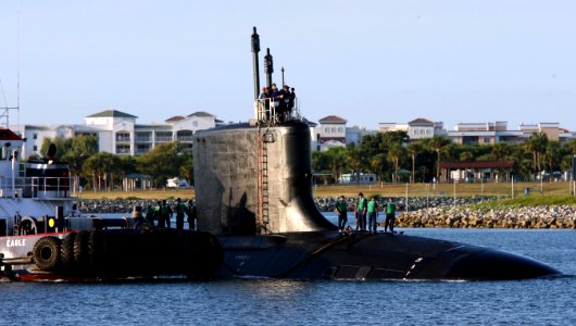 US Navy 060825-N-7441H-004 The Virginia-class attack submarine USS Texas (SSN 775) is guided into port by local tugboats near Port Canaveral