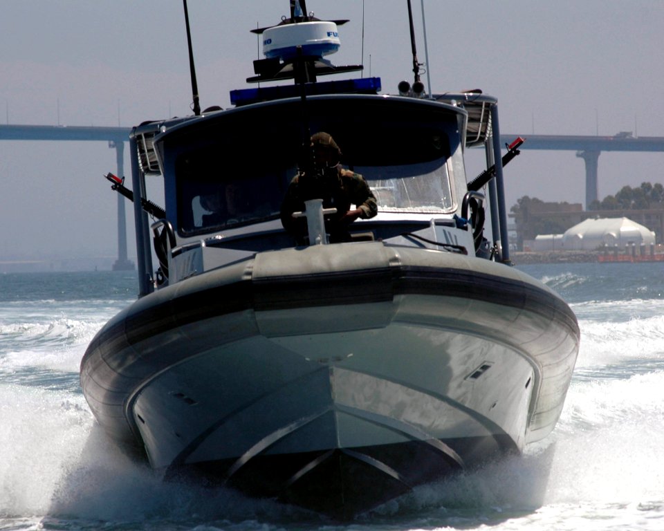 US Navy 060823-N-5148B-010 Sailors assigned Inshore Boat Unit Five Two (IBU-52) train in boat maneuvers while participating in Exercise Seahawk 2006 photo