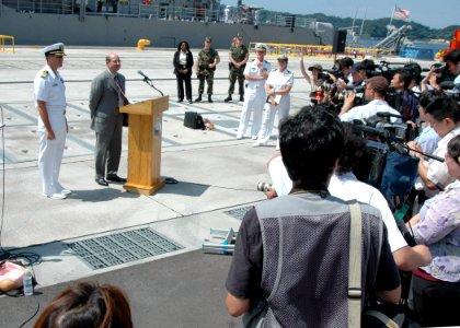 US Navy 060829-N-1332Y-320 Secretary of the Navy, the Honorable Dr. Donald C. Winter, answers questions from Japanese media shortly after arriving at Commander, Fleet Activities, Yokosuka
