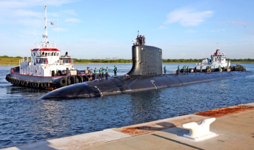 US Navy 060825-N-7441H-010 The Virginia-class attack submarine USS Texas (SSN 775) is guided into port by local tugboats near Port Canaveral