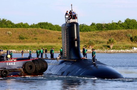 US Navy 060825-N-7441H-006 The Virginia-class attack submarine USS Texas (SSN 775) is guided into port by local tugboats near Port Canaveral