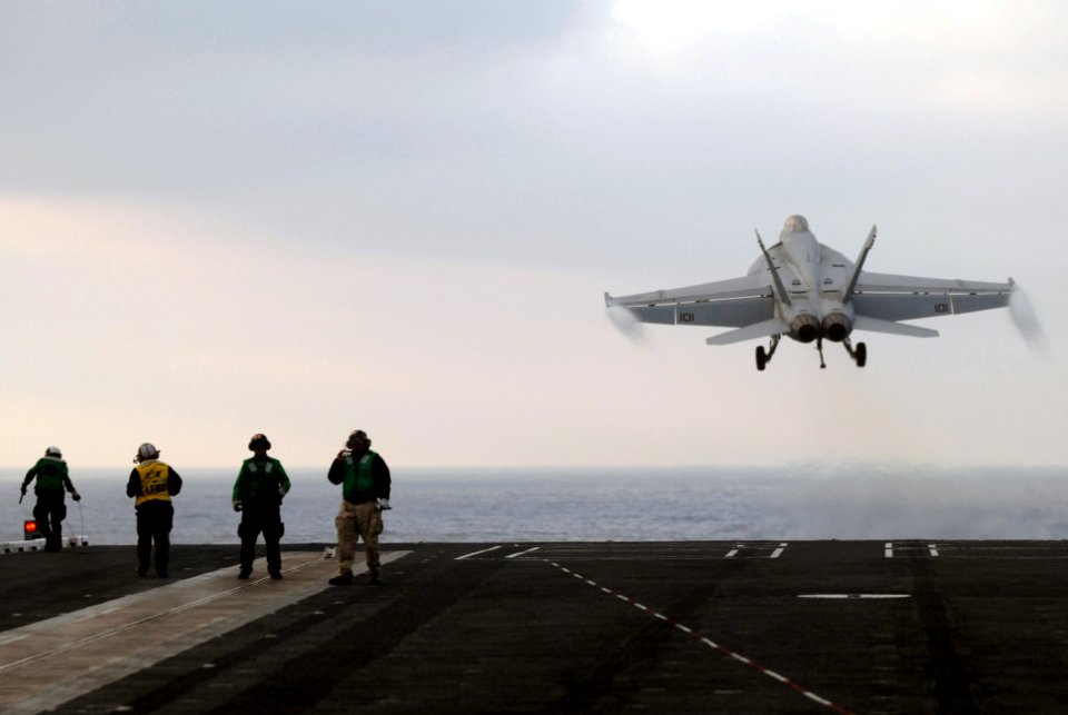 US Navy 060831-N-8158F-517 An F-A-18 Hornet assigned to the Fighting Redcocks of Strike Fighter Squadron Two Two (VFA-22) launches from the flight deck aboard the nuclear-powered aircraft carrier USS Nimitz (CVN 68)