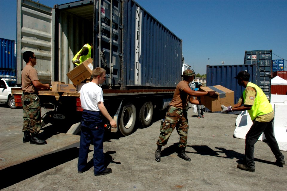 US Navy 060828-N-3714J-046 Members embarked with the Medical Treatment Facility aboard the Military Sealift Command hospital ship USNS Mercy (T-AH 19), help load a truck with medical supplies donated to a local hospital