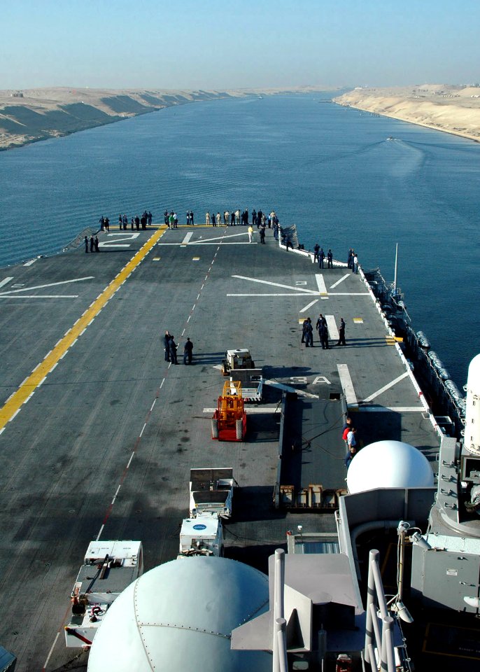 US Navy 060902-N-8547M-016 Sailors aboard the amphibious assault ship USS Saipan (LHA 2) view the scenery of Egypt from the ship's flight deck, as the ship transits south through the Suez Canal