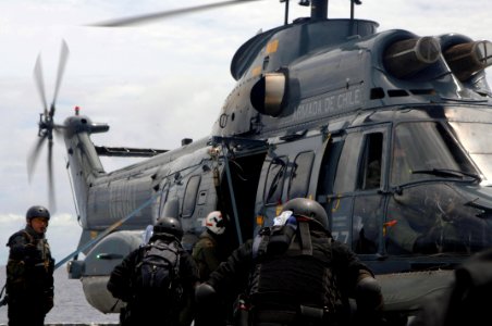 US Navy 060827-N-8298P-003 Chilean Naval Coast Guard prepare to take off from the flight deck aboard the Chilean M-class frigate Blanco Encalada (FF 15), to conduct fast rope training during the exercise PANAMAX 2006