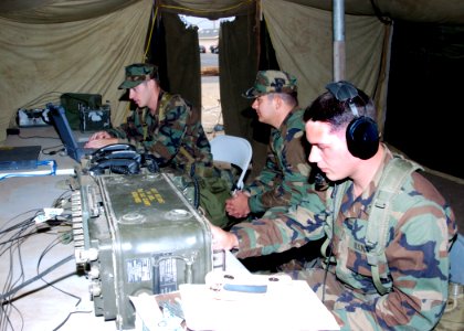 US Navy 060831-N-3560G-004 Members of Naval Mobile Construction Battalion Four (NMCB-4) handle communications traffic