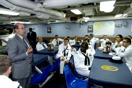 US Navy 060829-N-3642E-001 Secretary of the Navy (SECNAV), the Honorable Dr. Donald C. Winter talks with Sailors aboard the guided-missile cruise USS Shiloh (CG 67)