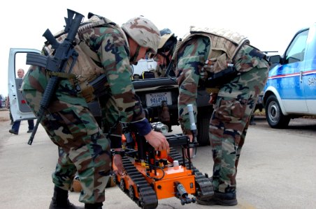 US Navy 060830-N-9195K-019 Two Sailors assigned to Naval Special Clearance Team One (NSCT-1) unload a robotic device used for explosive disposal while participating in Seahawk 2006