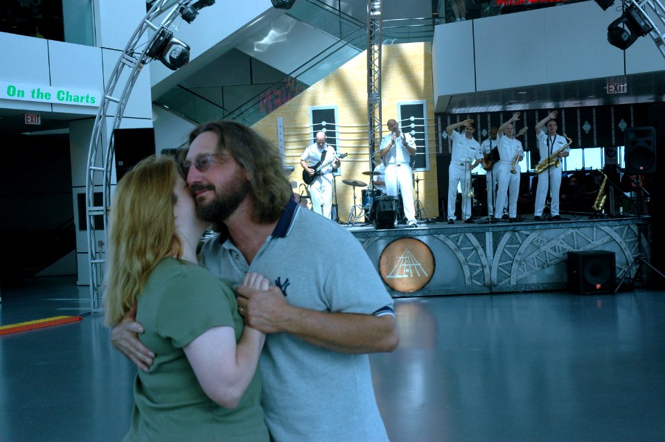 US Navy 060831-N-1805P-005 A couple enjoy the sound of Navy Band Mid-South rock ensemble Freedom at the Rock and Roll Hall of Fame and Museum in Cleveland