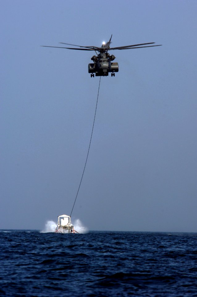 US Navy 061106-N-5555T-001 HM-53E Sea Dragon helicopters assigned to Helicopter Mine Countermeasure Squadron One Five (HM-15) demonstrate the mine sweeping capabilities of the Navy's MK-105 Magnetic Influence System