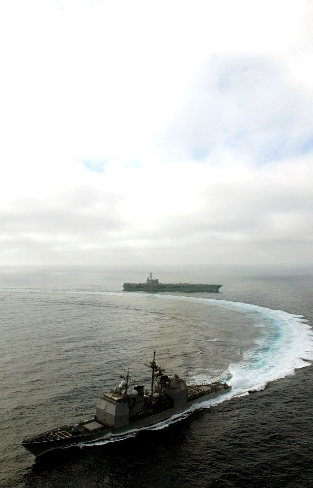 US Navy 061117-N-7130B-433 Following a successful fueling at sea (FAS) evolution, the guided-missile cruiser USS Lake Champlain (CG 57), breaks away from the Nimitz-Class aircraft carrier USS Ronald Reagan (CVN 76)