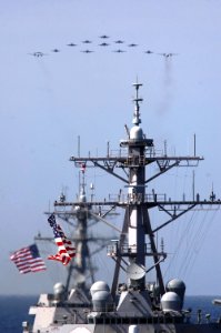 US Navy 061114-N-1332Y-171 Aircraft assigned to Carrier Air Wing Five (CVW-5) fly over a group of 18 U.S. and Japanese Maritime Self-Defense Force ships, at the conclusion the two nations' exercise ANNUALEX