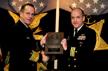 US Navy 061114-N-0696M-060 Chief of Naval Operations (CNO) Adm. Mike Mullen presents Cmdr. Brian T. Howes, commanding officer USS La Jolla (SSN 701), the Vice Admiral James B. Stockdale Award