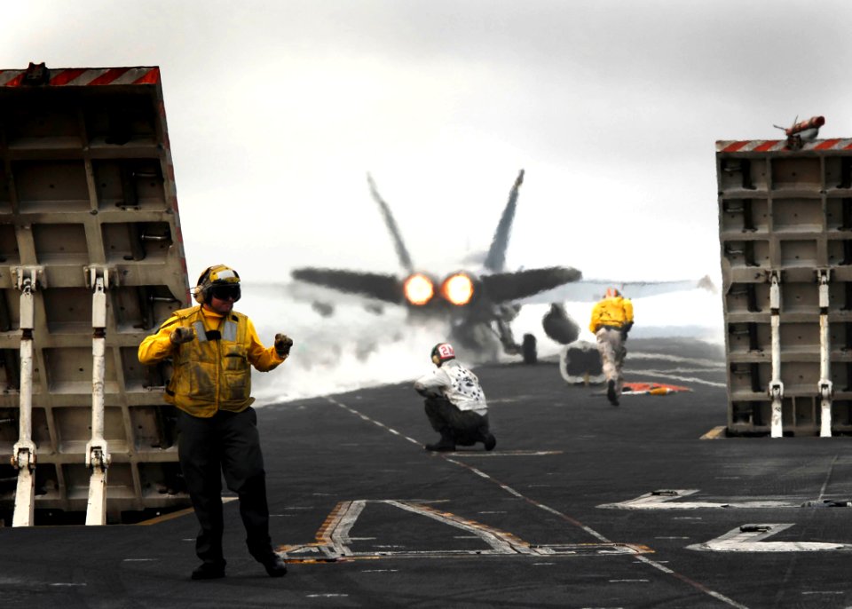 US Navy 061114-N-3729H-337 An F-A-18C Hornet assigned to the Argonauts of Strike Fighter Squadron One Four Seven (VFA-147) launches off the flight deck of the nuclear-powered aircraft carrier USS John C. Stennis (CVN 74)