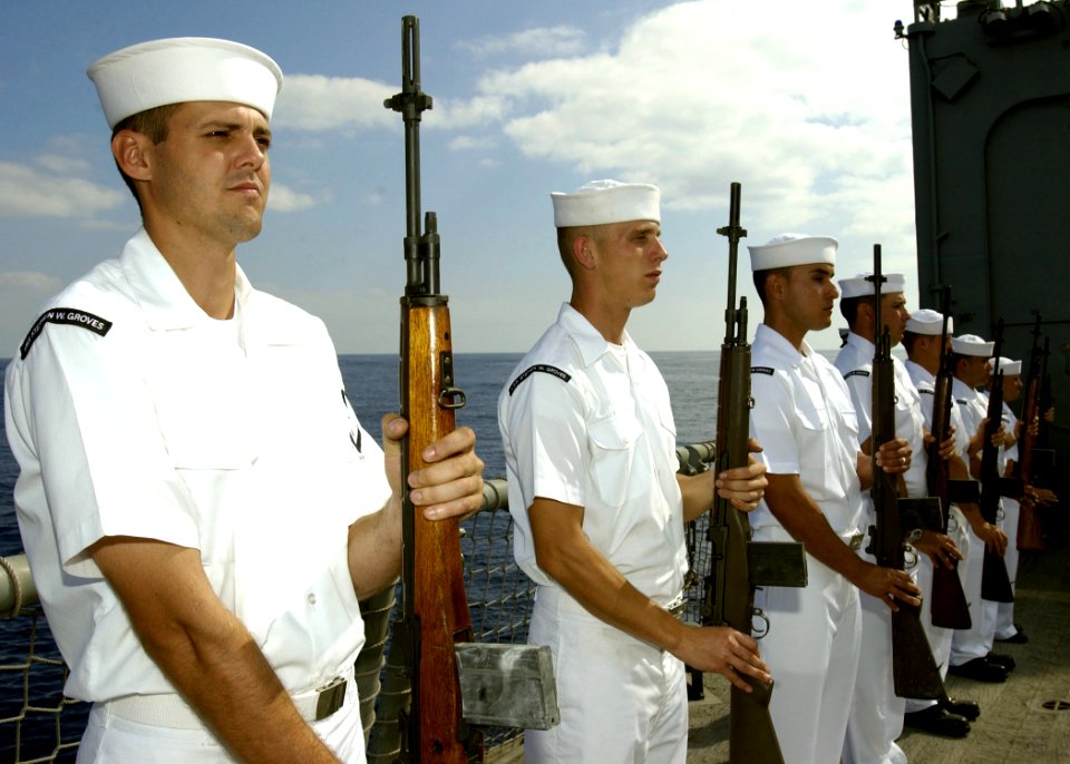 US Navy 061110-N-3285B-071 Sailors stationed aboard the Oliver Hazard Perry- class frigate USS Stephen W. Groves (FFG 29) participate in a burial at sea