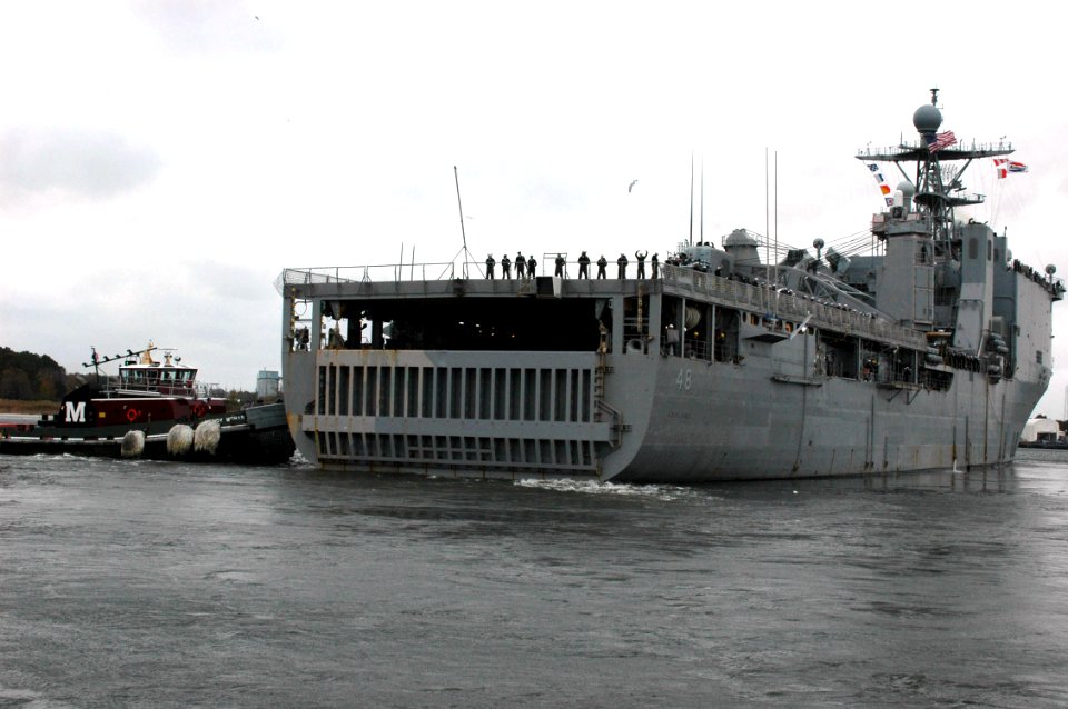 US Navy 061116-N-2456S-306 Sailors of Whidbey Island-class dock landing ship USS Ashland (LSD 48) man the rails as the ship gets underway from Naval Amphibious Base (NAB) Little Creek