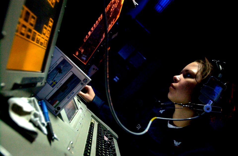 US Navy 061116-N-7130B-055 Operations Specialist 3rd Class Marian Cox stands watch aboard USS Ronald Reagan (CVN 76)