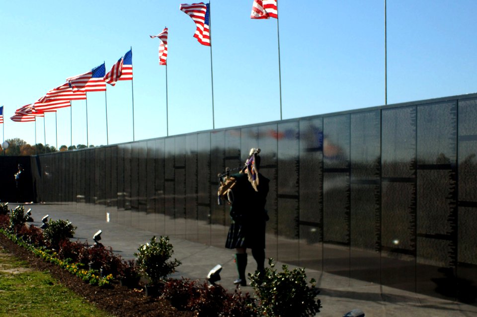 US Navy 061117-N-5307M-113 John Nugent, Vietnam veteran, plays the bagpipes as a part of the opening ceremony at the Dignity Memorial Vietnam Wall at Mt. Trashmore Park