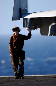 US Navy 061116-N-5961C-004 Airman Jillian Williamson is plane captain for F-A-18E Super Hornet assigned to Strike Fighter Squadron One One Five (VFA-115)
