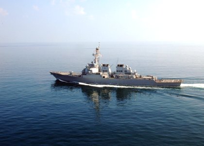 US Navy 061115-N-0490C-009 Arleigh Burke-class guided-missile destroyer USS Ramage (DDG 61) sails ahead after completing a vertical replenishment (VERTREP) with the Nimitz-class aircraft carrier USS Dwight D. Eisenhower (CVN 69