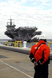 US Navy 061118-N-1831S-038 Sailors assigned to USS Enterprise (CVN 65) return to Naval Station Norfolk following operations in support of the global war on terrorism