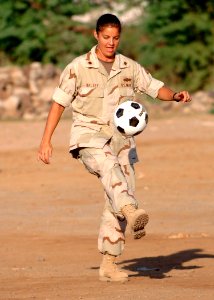 US Navy 061120-N-1328C-108 Lt. Cmdr. Wendy Halsey from Honolulu, Hawaii, kicks a soccer ball around like she has since she was six years old