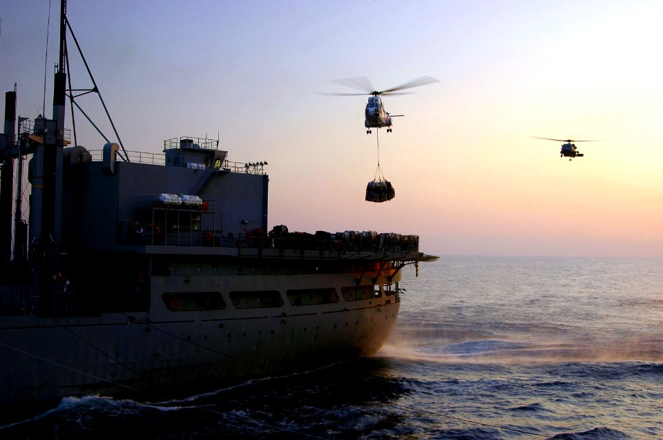 US Navy 061130-N-0490C-004 An SA-330 Puma helicopter assigned to Military Sealift Command (MSC) combat stores ship USNS Spica (T-AFS 9) moves supplies during a vertical replenishment (VERTREP)