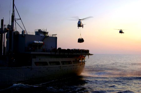 US Navy 061130-N-0490C-004 An SA-330 Puma helicopter assigned to Military Sealift Command (MSC) combat stores ship USNS Spica (T-AFS 9) moves supplies during a vertical replenishment (VERTREP)