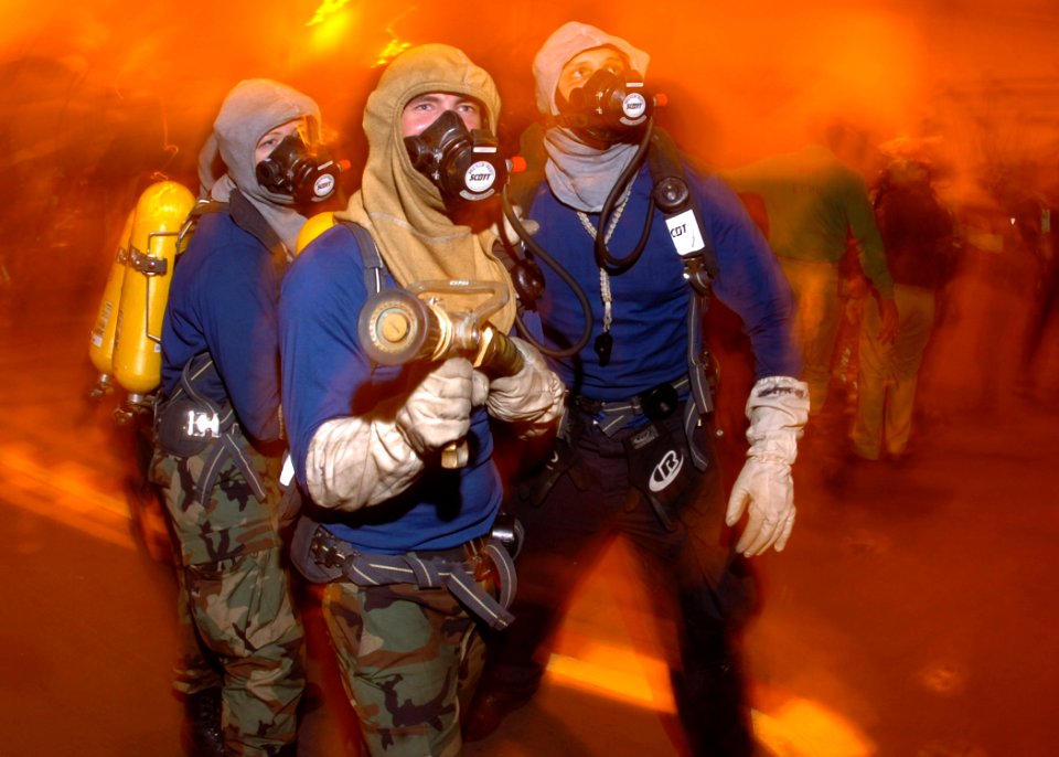 US Navy 061120-N-8907D-004 Sailors participate in a general quarters (GQ) drill to maintain mission readiness aboard the Nimitz-class aircraft carrier USS Dwight D. Eisenhower (CVN 69)