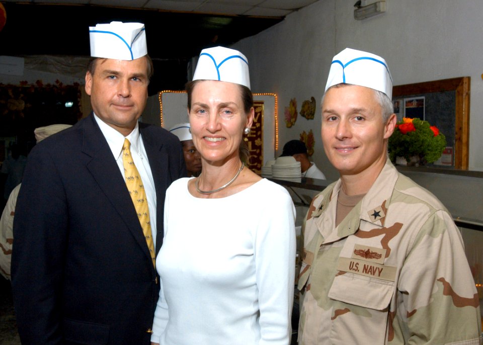 US Navy 061123-N-1328C-149 U.S. Ambassador to Djibouti, W. Stuart Symington, his wife Susan Symington and Deputy Commander, U.S. Combined Joint Task Force - Horn of Africa (CJTF-HOA), Rear Adm. Tim Moon, assist in serving Thank
