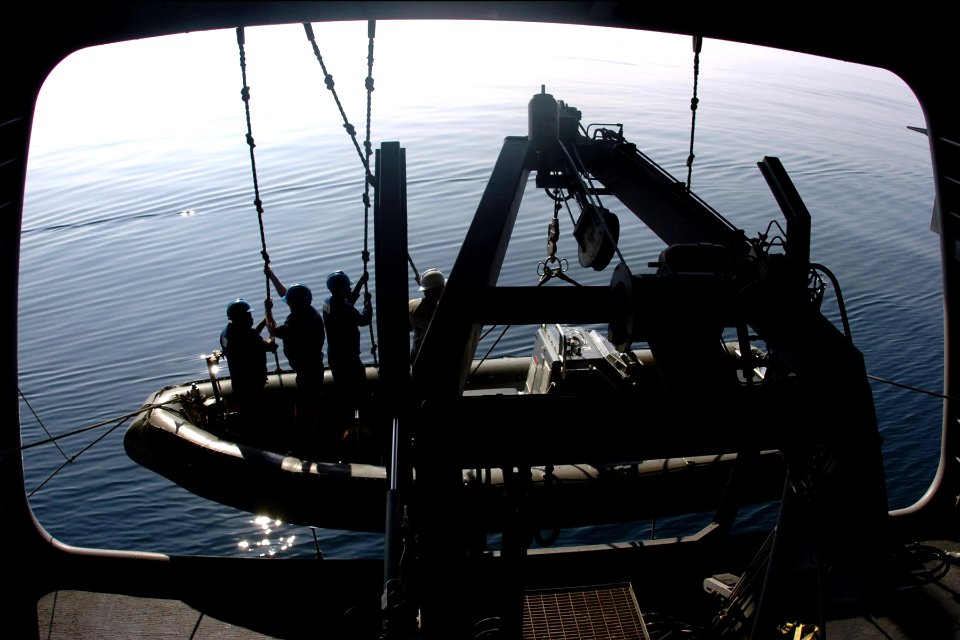 US Navy 061116-N-8907D-001 Sailors secure a Rigid Hull Inflatable Boat (RHIB) after a man overboard drill aboard the Nimitz-class aircraft carrier USS Dwight D. Eisenhower (CVN 69)
