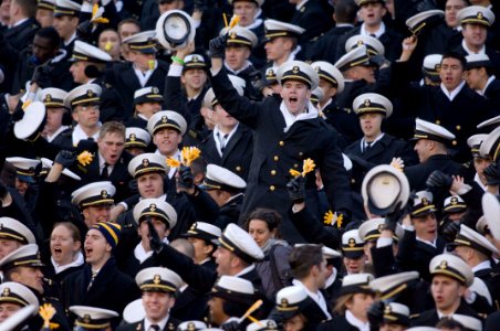 US Navy 061202-N-5319A-037 U.S. Naval Midshipmen cheer as they tie the score during the first series of the 2006 Army Navy Game
